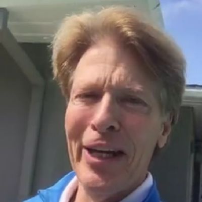 Jack Wagner is outside his house making a video.